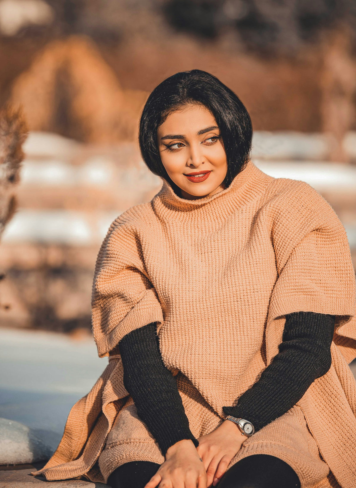 Aadu Knit Poncho in Peach — view 1